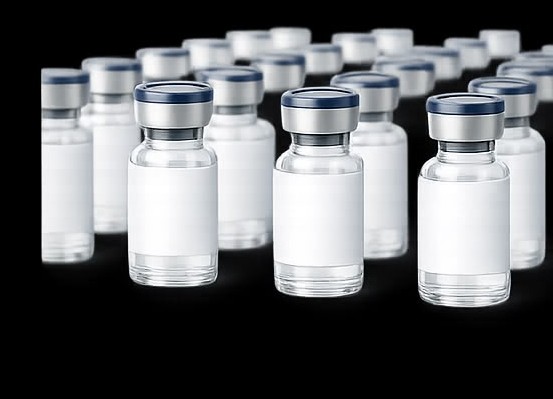 Rows of unbranded research vials, supplied in bulk.